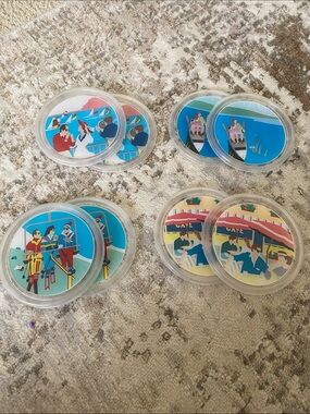 Set of eight vintage coasters